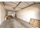 Spacious garage interior with ample storage space, suitable for parking vehicles and storing belongings at 104 Breezy Tree Ct # 201, Las Vegas, NV 89145