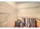 Functional walk-in closet with metal shelving for ample storage space at 104 Breezy Tree Ct # 201, Las Vegas, NV 89145