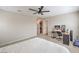 Bright and airy bedroom with a modern desk area, closet and a calming atmosphere at 1115 Brilliant Meadow Ave, North Las Vegas, NV 89086