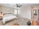 Comfortable bedroom with large bed, desk, and ample natural light creating a serene retreat at 1115 Brilliant Meadow Ave, North Las Vegas, NV 89086