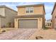 Charming two-story home with a two-car garage and desert landscaping at 1115 Brilliant Meadow Ave, North Las Vegas, NV 89086
