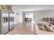 Modern kitchen with stainless steel appliances that opens into a dining area, great for Gathering meals at 1115 Brilliant Meadow Ave, North Las Vegas, NV 89086