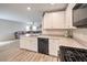 Well-equipped kitchen with stainless steel appliances, seamlessly connecting to the living area at 1115 Brilliant Meadow Ave, North Las Vegas, NV 89086