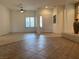 Open floor plan featuring tiled flooring and ample natural light, leading to the main entrance at 1654 Danbury Crossing Dr, Henderson, NV 89052