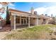 Wide backyard with a covered patio offers a perfect spot for relaxing outdoors at 178 Beach Oak Ave, Henderson, NV 89002