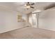 Bright bedroom with a ceiling fan and a window providing natural light at 178 Beach Oak Ave, Henderson, NV 89002