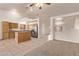 Modern kitchen with stainless steel appliances, granite countertops, and a functional island, great for culinary enthusiasts at 178 Beach Oak Ave, Henderson, NV 89002