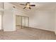 This main bedroom is spacious and filled with natural light from the windows at 178 Beach Oak Ave, Henderson, NV 89002