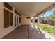 Covered patio with extended awning provides a shaded spot with backyard views and privacy at 178 Beach Oak Ave, Henderson, NV 89002