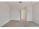 Bright bedroom featuring carpet and multiple closets at 19 E Agate Ave # 402, Las Vegas, NV 89123
