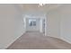 Well-lit bedroom with a large window and neutral carpet at 19 E Agate Ave # 402, Las Vegas, NV 89123