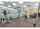 Community gym featuring workout equipment and a modern spiral staircase at 19 E Agate Ave # 402, Las Vegas, NV 89123