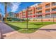 Beautifully maintained lawns adjacent to buildings and recreational areas create a serene environment at 19 E Agate Ave # 402, Las Vegas, NV 89123
