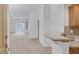 Inviting living room showcasing neutral carpeting and lots of natural light at 19 E Agate Ave # 402, Las Vegas, NV 89123