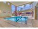 An indoor pool with large windows provides a bright, relaxing atmosphere at 19 E Agate Ave # 402, Las Vegas, NV 89123