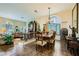 Open-concept dining room with ornate table and access to the living room at 2012 Lady Lake St, Las Vegas, NV 89128
