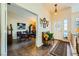 Bright and open foyer with tile flooring, showcasing the entry and view of dining room at 2012 Lady Lake St, Las Vegas, NV 89128