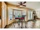 Bright kitchen with a cozy breakfast nook featuring a window view, and access to the fireplace at 2012 Lady Lake St, Las Vegas, NV 89128