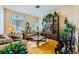 Comfortable living room boasts large windows and a view of backyard at 2012 Lady Lake St, Las Vegas, NV 89128