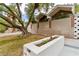 View of the home's mid-century modern architecture and block wall with planter at 2058 Ottawa Dr, Las Vegas, NV 89169