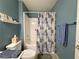 A tub and shower combination with a framed mirror, wall decor, and towel bar at 2270 Canyon Song Ave, Laughlin, NV 89029