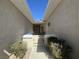 Enclosed courtyard with seating offers privacy and security for the main entrance of this home at 2270 Canyon Song Ave, Laughlin, NV 89029