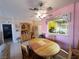 View of dining area with wood furniture, built-in cabinet, and kitchen view at 2270 Canyon Song Ave, Laughlin, NV 89029