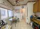 A bright kitchen featuring a breakfast table and stainless steel appliances at 2270 Canyon Song Ave, Laughlin, NV 89029