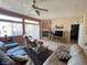 Relaxing living room features tiled floors, a fireplace, and neutral colors at 2270 Canyon Song Ave, Laughlin, NV 89029