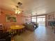 Comfortable living area features tile flooring, fireplace, and modern lighting at 2270 Canyon Song Ave, Laughlin, NV 89029