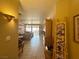 Spacious living room with tile flooring, ceiling fans and a sliding glass door at 2270 Canyon Song Ave, Laughlin, NV 89029