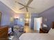 Comfortable bedroom featuring a seating area, hallway and a doorway to the bathroom at 2270 Canyon Song Ave, Laughlin, NV 89029