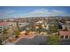 Broad aerial view showing community near commercial area with parking lots and attractive landscaping at 2300 E Silverado Ranch Blvd # 1070, Las Vegas, NV 89183