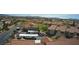 Extensive aerial view showing community with landscaped grounds, parking, and attractive residential buildings at 2300 E Silverado Ranch Blvd # 1070, Las Vegas, NV 89183
