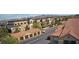 Attractive community with Spanish tile roofs, garages, landscaped grounds and mountain views at 2300 E Silverado Ranch Blvd # 1070, Las Vegas, NV 89183