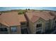 A charming apartment complex with Spanish tile roof and private balconies at 2300 E Silverado Ranch Blvd # 1070, Las Vegas, NV 89183