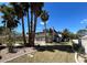Spacious backyard with lush lawn, mature trees, pool and tasteful landscaping at 2428 Greens Ave, Henderson, NV 89014