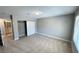 Bedroom features neutral walls, plush carpet and large sliding-door closet at 2428 Greens Ave, Henderson, NV 89014