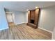 Living room with a striking brick fireplace adding warmth and character at 2428 Greens Ave, Henderson, NV 89014