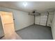 This is a view of the garage with epoxy floor and an entrance to the rest of the house at 2428 Greens Ave, Henderson, NV 89014