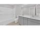 Bathroom featuring a double vanity, bathtub and shower combination at 2449 Padulle Pl, Henderson, NV 89044