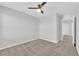 Neutral bedroom with carpet flooring and ceiling fan offering a versatile and relaxing space at 2449 Padulle Pl, Henderson, NV 89044