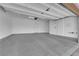 Spacious two car garage with ample space for vehicles and storage at 2449 Padulle Pl, Henderson, NV 89044