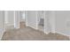 Neutral hallway with carpet flooring connecting multiple rooms, offering seamless flow at 2449 Padulle Pl, Henderson, NV 89044