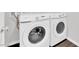 Modern laundry room features a new Samsung washer and dryer set for efficient laundry at 2449 Padulle Pl, Henderson, NV 89044