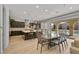 Elegant dining room with views of the landscaped backyard and pool area at 2804 Candelaria Dr, Henderson, NV 89074
