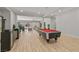 Well-lit game room showcasing a pool table and stylish decor, perfect for entertaining at 2804 Candelaria Dr, Henderson, NV 89074