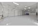 Spacious multi-car garage with ample lighting, multiple doors, and epoxy flooring at 2804 Candelaria Dr, Henderson, NV 89074