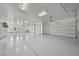 Spacious multi-car garage with ample lighting, multiple doors, and epoxy flooring at 2804 Candelaria Dr, Henderson, NV 89074