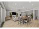 Open-concept living space with hardwood flooring and neutral décor, perfect for entertaining and relaxation at 2804 Candelaria Dr, Henderson, NV 89074